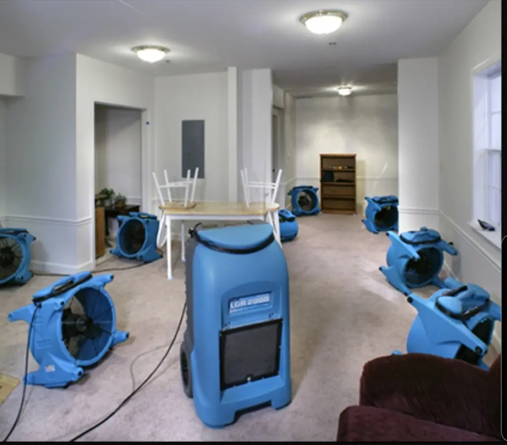 Air movers and dehumidifier setup for Water Damage Restoration in Severn